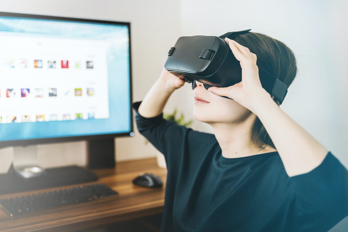 woman-holding-vr-headset
